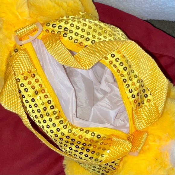 Like-new plush duck tote/backpack, yellow with gold sequins & waterproof pouch - Picture 6 of 6